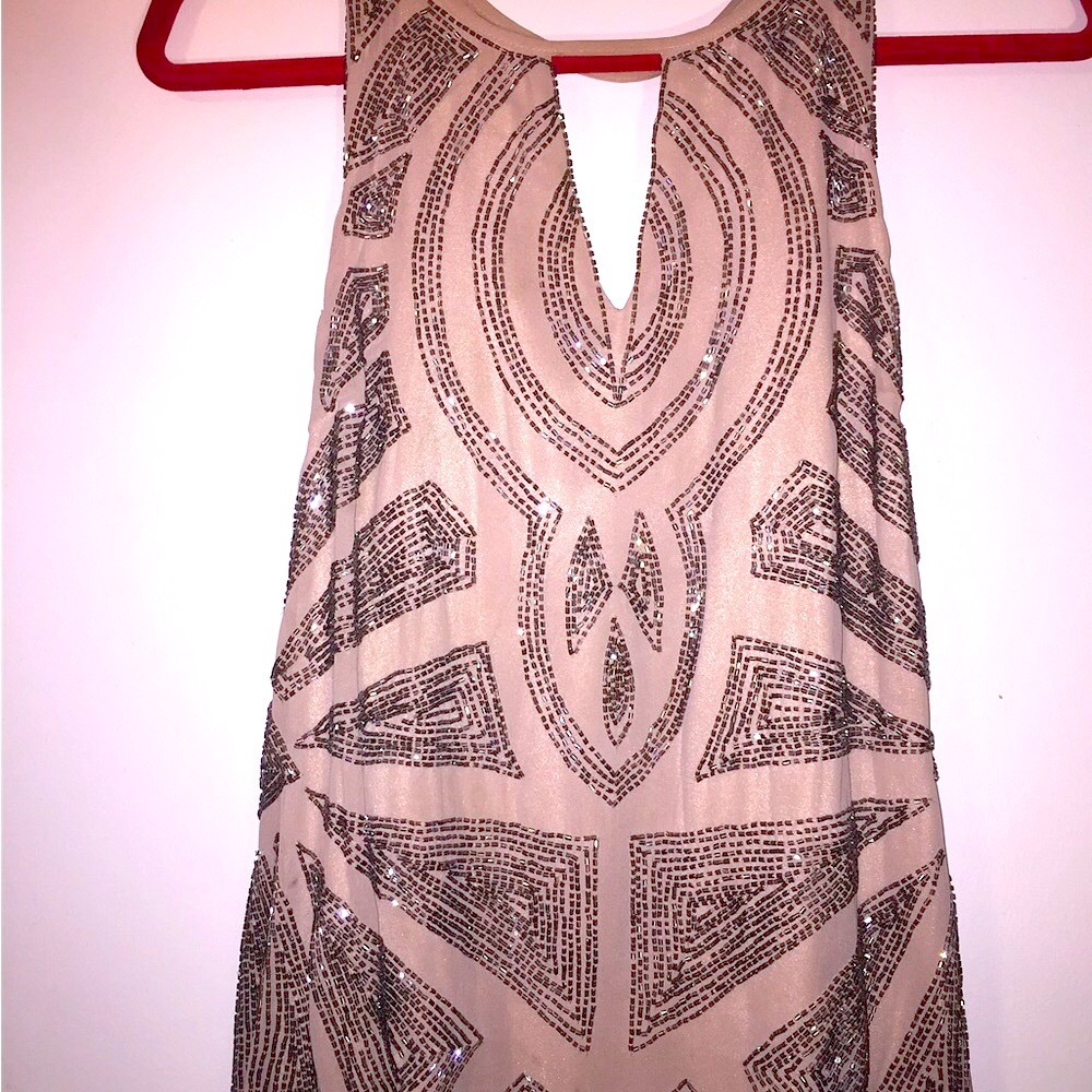 Beaded silk sleeveless tunic by Izzy Liszt